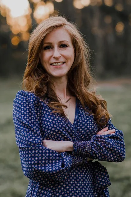 Andi Senter, MD, recipient of the 2026 UNC Breast SPORE developmental research award, photographed outdoors at golden hour.